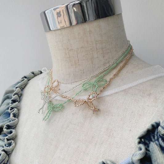 KA273 Small Ribbon Necklace - Beige | Green | Clear